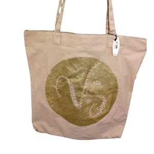 Victoria Secret Gold and Tan bag.